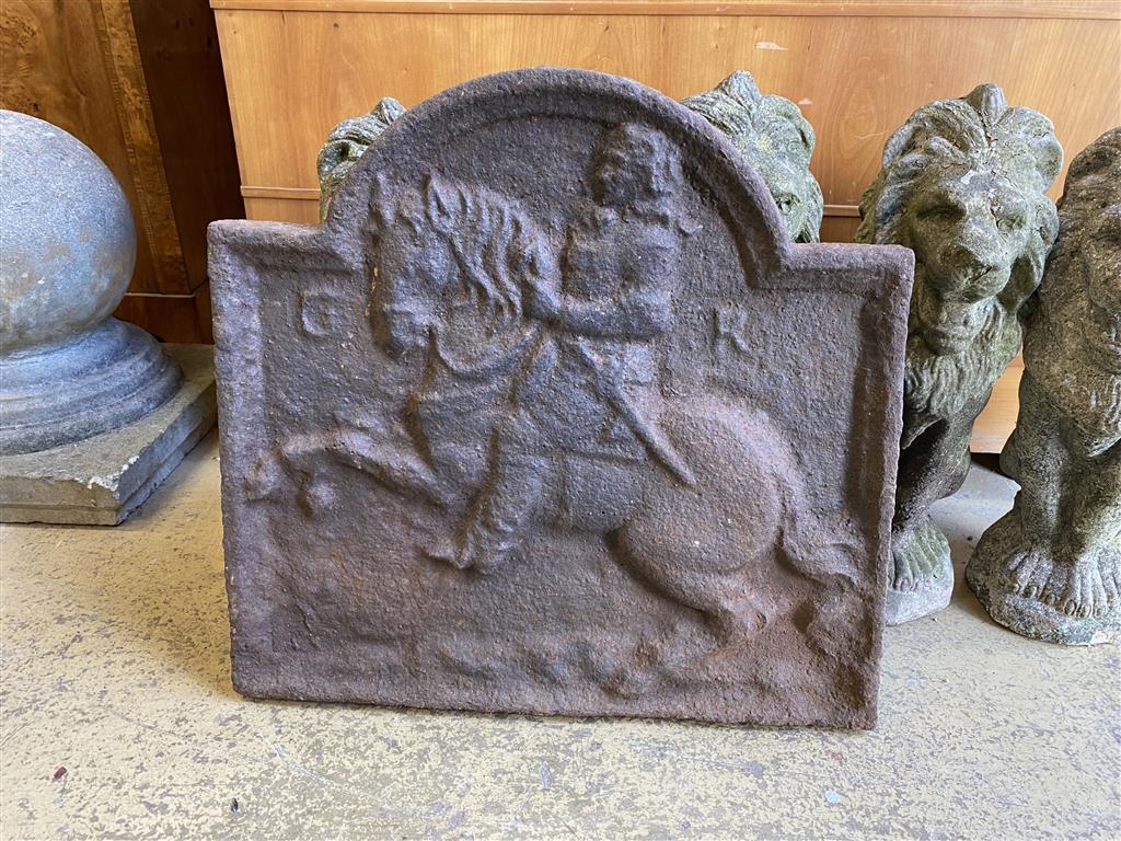 A cast iron fireback, width 55cm, height 54cm